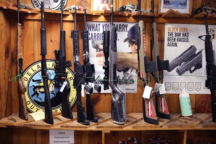 Rifles are offered for sale at a store in Tinley Park, Illinois. There was a record-setting surge in gun sales last year.
