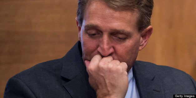 UNITED STATES - MARCH 7: From left, Sen. Jeff Flake, R-Ariz., and Sen. Tim Scott, R-S.C., attend the confirmation hearing for Sally Jewell, nominee to be Interior Secretary, in the Senate Energy and Natural Resources Committee on Thursday, March 7, 2013. (Photo By Bill Clark/CQ Roll Call)