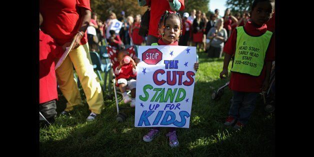 WASHINGTON, DC - OCTOBER 02: Children from the Head Start program at the Edward C. Mazique Parent Child Center join supporters and members of Congress to call for an end to the partial federal government shut down and fund the comprehensive education, health and nutrition service for low-income children and their families outside the U.S. Capitol October 2, 2013 in Washington, DC. The federal government is in the second day of a partial shutdown after House Republicans and Senate Democrats refused to agree on a budget. (Photo by Chip Somodevilla/Getty Images)