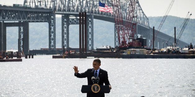 TARRYTOWN, NY - MAY 14: U.S. President Barack Obama delivers remarks on infrastructure in the United States at the Washington Irving Boat Club on May 14, 2014 in Tarrytown, New York. Tomorrow President Obama will attend the opening of the National September 11 Memorial and Museum. (Photo by Andrew Burton/Getty Images)