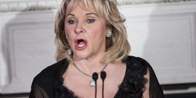 National Governors Associating Chairman Oklahoma Governor Mary Fallin speaks during the 2014 Governors Dinner in the State Dining Room of the White House February 23, 2014 in Washington, DC. Obama and Biden hosted state governors from around the nation for a dinner during the annual winter meeting National Governors Association which is held in Washington. AFP PHOTO/Brendan SMIALOWSKI (Photo credit should read BRENDAN SMIALOWSKI/AFP/Getty Images)