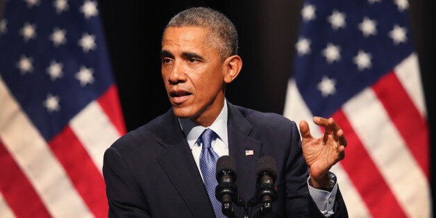 EVANSTON, IL - OCTOBER 02: President Barack Obama speaks to students and faculty from the Kellogg School of Management at Northwestern University on October 2, 2014 in Evanston, Illinois. Obama highlighted the nation's recent economic improvements during his speech. (Photo by Scott Olson/Getty Images)