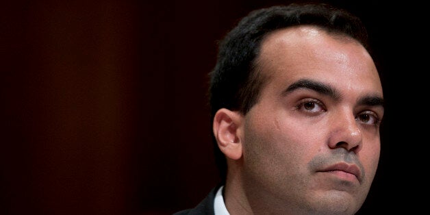 Rohit Chopra, student loan ombudsman for the Consumer Financial Protection Bureau (CFPB), listens during a Senate Budget Committee hearing on student loans in Washington, D.C., U.S., on Wednesday, June 4, 2014. Education debt is increasing as students and parents depend on loans to fund college and graduate school amid escalating costs. Rising default rates show they are also struggling to repay. Photographer: Andrew Harrer/Bloomberg via Getty Images 