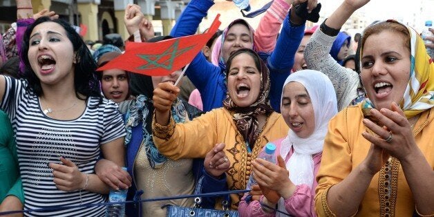 Moroccans shout slogans during a protest calling for gender equality as they mark International women's day in Rabat on March 8, 2015. AFP PHOTO / FADEL SENNA (Photo credit should read FADEL SENNA/AFP/Getty Images)