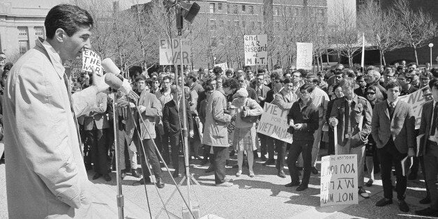 Howard Zinn, left, Prof. of Government at Boston University as he addressed an anti-was rally on Student Center steps at Massachusetts Institute of Technology in Cambridge, Mass., April 12, 1967. The rally was in protest of the war in Vietnam. (AP Photo)