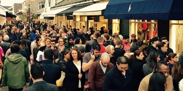 Queuing to get into Ralph Lauren. Black Friday at Bicester Village designer outlet shopping centre, Oxfordshire, UK. Friday 28 November 2014