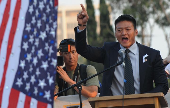 Lieutenant Dan Choi who has just been dismissed from the US Army for 'being openly gay', declares that he will try to protest his case during President Barack Obama's upcoming visit to Los Angeles, at a gay protest rally in Hollywood on May 26, 2009. California's Supreme Court upheld a referendum that outlawed gay marriage, but said 18,000 same-sex weddings carried out before the ban would remain valid. Gay and lesbian activists had sought to overturn the result of a November referendum, known as Proposition 8, which redefined marriage in California as being unions between men and women only. AFP PHOTO/Mark RALSTON (Photo credit should read MARK RALSTON/AFP/Getty Images)