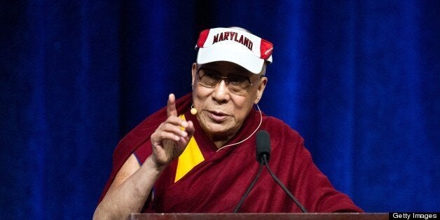 Tibetan spiritual leader the Dalai Lama delivers the Sadat Lecture for Peace, entitled 'Peace Through Compassion: Connecting a Multi-Faith World,' at the University of Maryland in College Park, Maryland, on May 7, 2013. AFP PHOTO/Nicholas KAMM (Photo credit should read NICHOLAS KAMM/AFP/Getty Images)