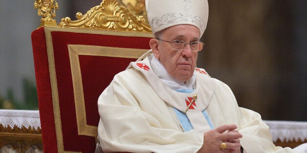 Pope Francis leads a mass at St Peter's Basilica on January 1st, 2014 at the Vatican. AFP PHOTO / FILIPPO MONTEFORTE (Photo credit should read FILIPPO MONTEFORTE/AFP/Getty Images)