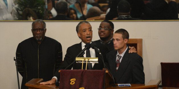 NEW YORK, NY - JULY 23: Reverend Al Sharpton introduces Ramsey Orta, the civilian who video recorded the incident with the NYPD and the late Eric Garner, during the funeral service for Eric Garner held at Bethel Baptist Church on July 23, 2014 in the Brooklyn borough of New York City. Garner, 43, died after police put him in a chokehold outside of a convenience store on Staten Island for illegally selling cigarettes. (Photo by Julia Xanthos-POOL/Getty Images)