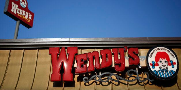 A Wendy's Co. restaurant stands in Springdale, Arkansas, U.S., on Tuesday, July 28, 2015. Wendy's Co. is scheduled to release quarterly earnings on August 5. Photographer: Luke Sharrett/Bloomberg via Getty Images