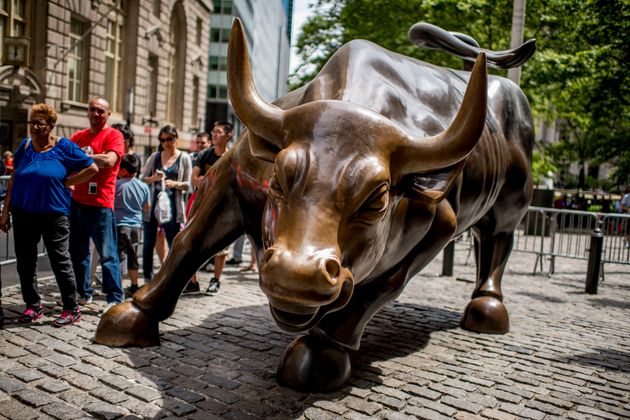 Charging Bull by Arturo Di Modica near Wall Street Stock Exchange on June 17 2012 in New York, United...