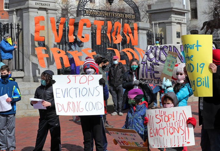 BOSTON - MARCH 14: People and students from Worker's Circle of Boston and members of City Life Vida Urbana protest to rally support behind house bill HD3030, which seeks to stop evictions during the ongoing coronavirus pandemic, at the Massachusetts State House in Boston on March 14, 2021. (Photo by Jim Davis/The Boston Globe via Getty Images)