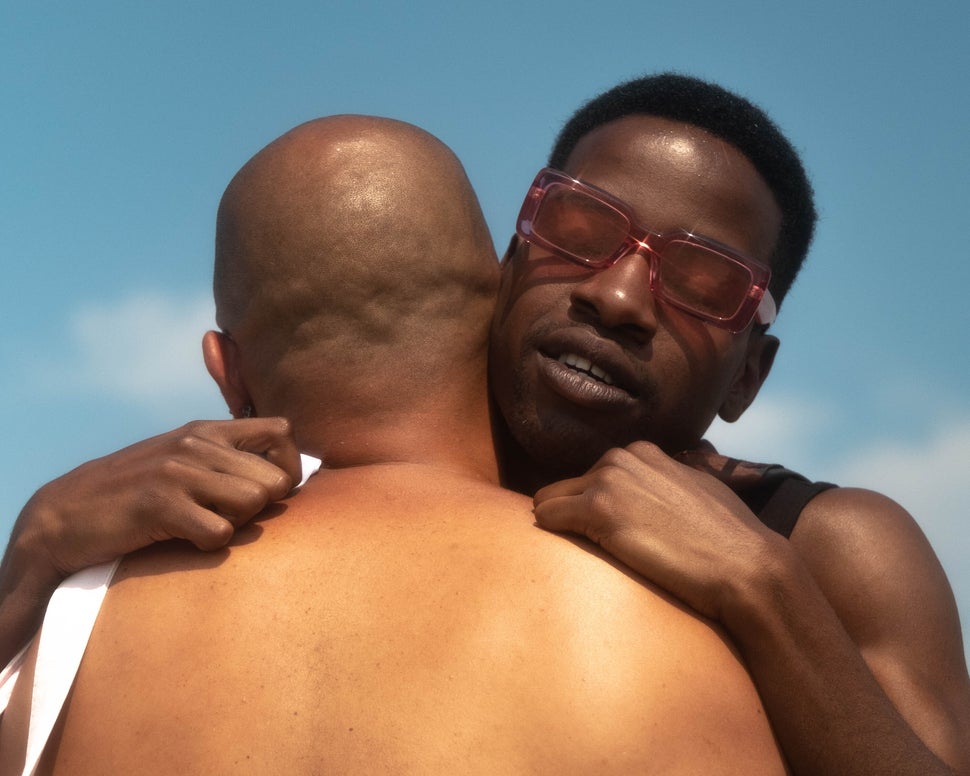 Ernie hugs a friend during the Beach Solidarity March.