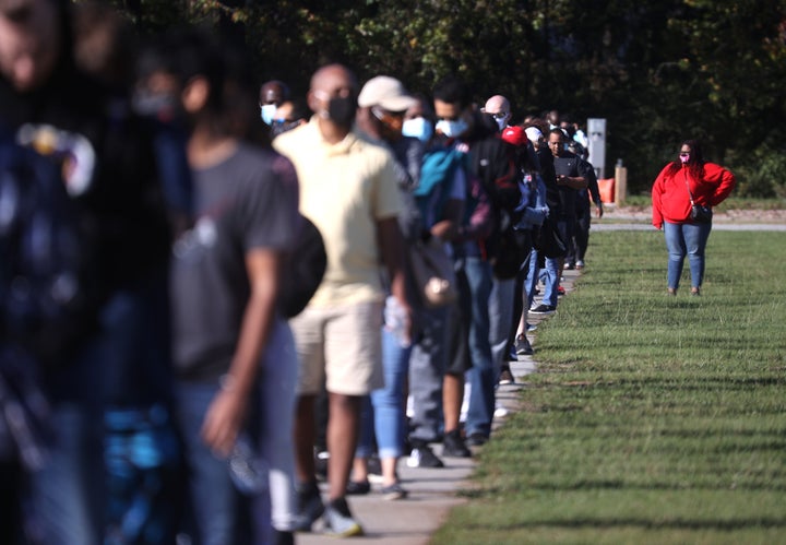 Long lines have plagued elections in states like Georgia (pictured) after hundreds of polling locations were closed following the Shelby County decision. 