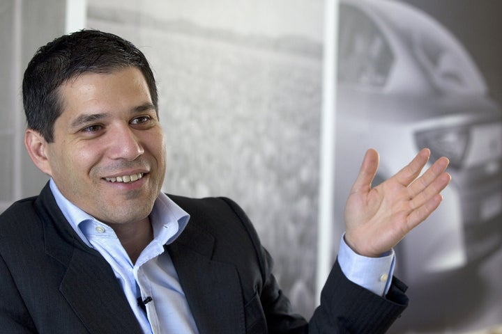 TO GO WITH AFP STORY BY GAVIN RABINOWITZ US-Israeli Shai Agassi, 43, founder and chief executive officer of Better Place, an electric vehicle services provider, speaks during an interview with AFP in Glilot north of Tel Aviv on January 17, 2011 . AFP PHOTO/JACK GUEZ (Photo credit should read JACK GUEZ/AFP/Getty Images)