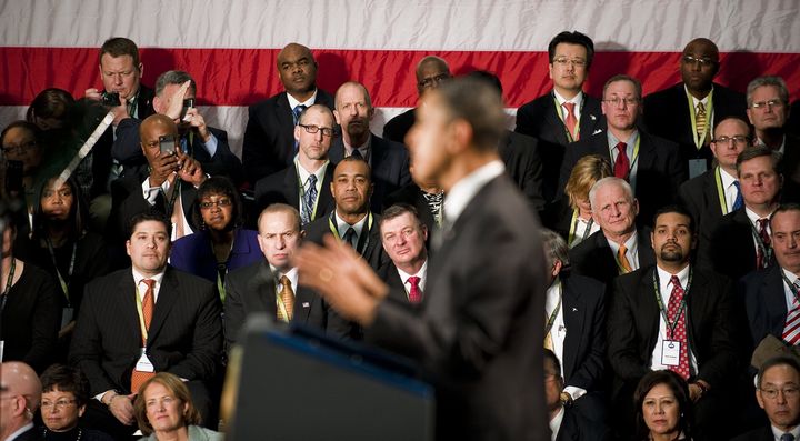Small business leaders and members of the audience listen as US President Barack Obama speaks during the Winning the Future Forum on Small Business in Cleveland, Ohio, February 22, 2011. AFP PHOTO/Jim WATSON (Photo credit should read JIM WATSON/AFP/Getty Images)