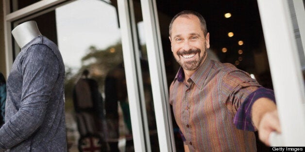 Portrait of happy mature male store owner standing at the doorwayhttp://i449.photobucket.com/albums/qq220/iphotoinc/MenBanner1.jpg