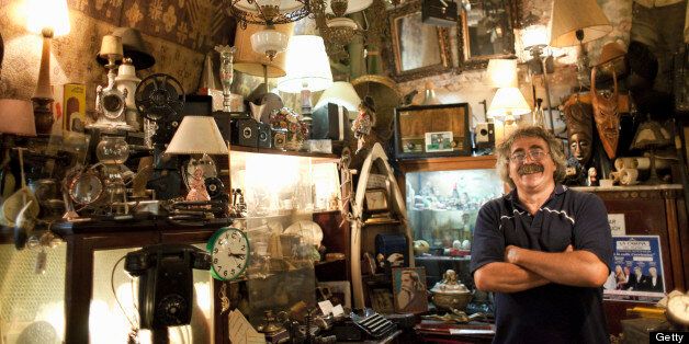 antique store owner in his shop