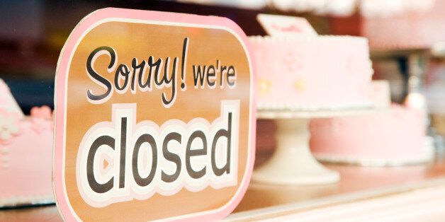 Closed Sign in Front Bakery WIndow