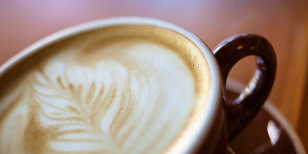 Detail shot of foam latte art in a cup of mocha.