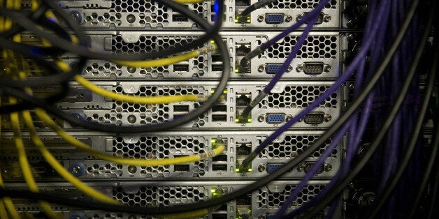 Network cables sit connected to servers in a computer room at the Yahoo! Inc. Lockport Data Center in Lockport, New York, U.S., on Friday, Sept. 26, 2014. Yahoo Inc., a $40 billion Web portal, is expected to release third quarter earnings on Oct. 21. Photographer: Andrew Harrer/Bloomberg via Getty Images