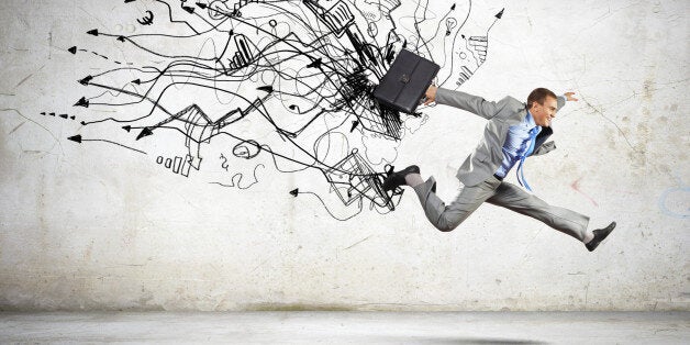 Image of businessman in jump against sketch background