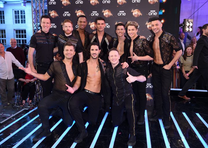 Kevin posing with his fellow male Strictly pros in 2018