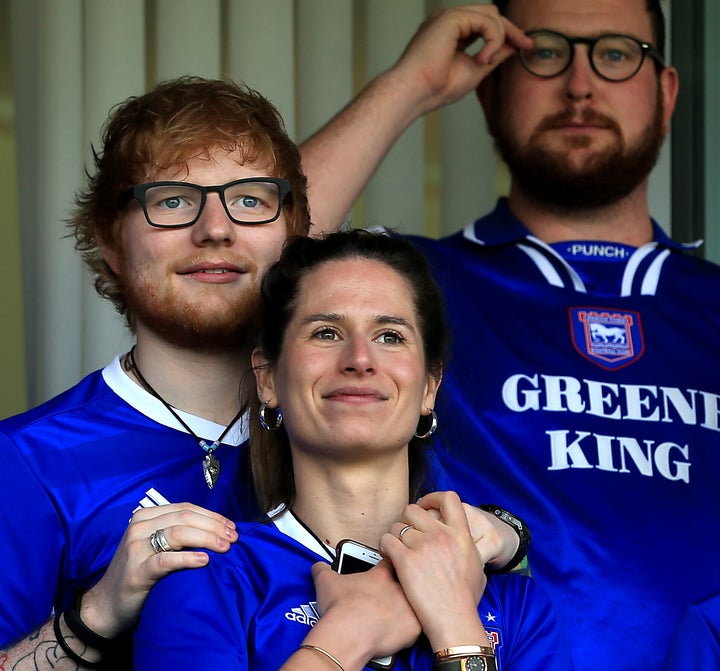 Ed Sheeran and fiance Cherry Seaborn look on during the Sky Bet Championship match between Ipswich Town and Aston Villa on Ap