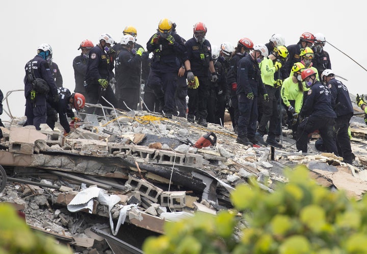 Surfside Mayor Charles Burkett said crews were doing everything possible to save as many people as they could.