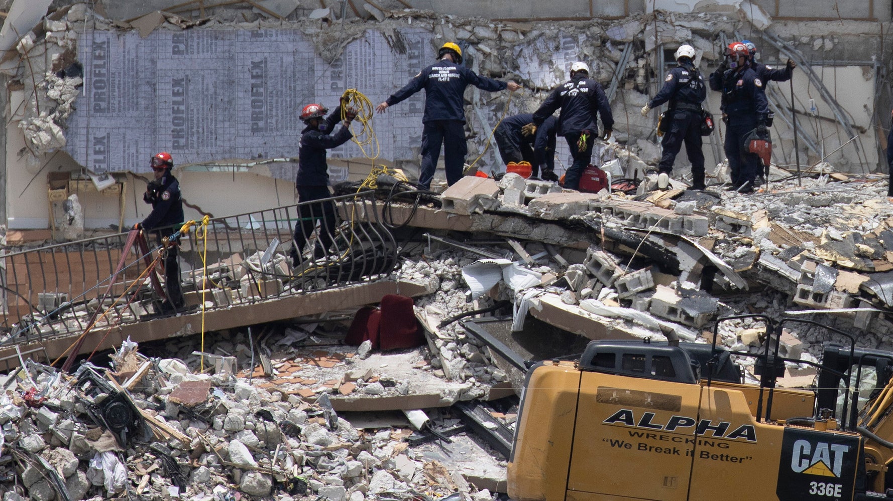 Rescue Crews Find Another Body At Collapse Site, Raising Death Toll To Five