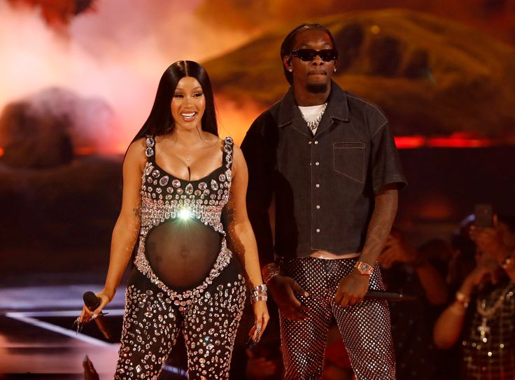 Cardi B and Offset of Migos perform onstage at the BET Awards 2021.