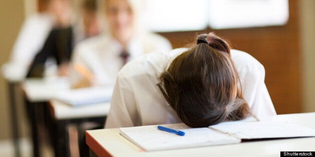 frustrated high school student in classroom