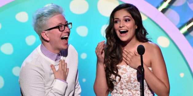 LOS ANGELES, CA - AUGUST 10: Internet personalities Tyler Oakley (L) and Bethany Mota onstage during FOX's 2014 Teen Choice Awards at The Shrine Auditorium on August 10, 2014 in Los Angeles, California. (Photo by Kevin Winter/Getty Images)