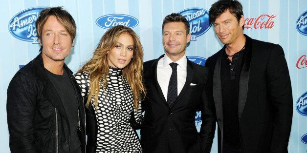 LOS ANGELES, CA - JANUARY 14: (L-R) Musician Keith Urban, singer Jennifer Lopez, host Ryan Seacrest and singer Harry Connick Jr. arrive at the premiere of Fox's 'American Idol Xlll' at UCLA's Royce Hall on January 14, 2014 in Los Angeles, California. (Photo by Kevin Winter/Getty Images)