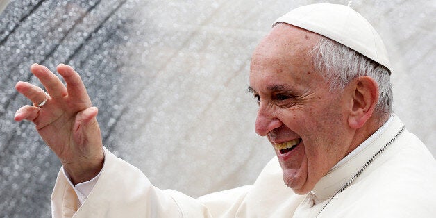 Pope Francis waves as he leaves at the end of the Jubilee audience in Saint Peter's Square at the Vatican May 14, 2016. REUTERS/Alessaandro Bianchi