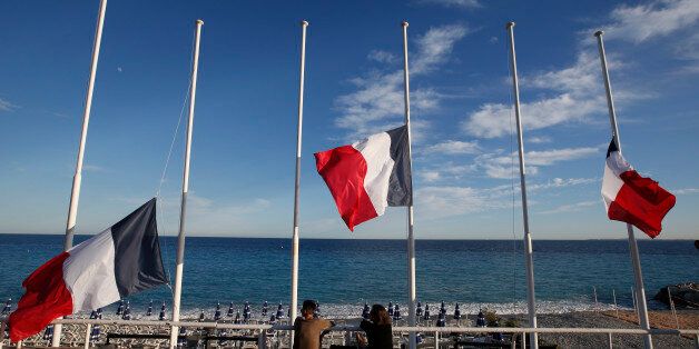 Flags fly at half-mast in memory of victims the day after a truck ran into a crowd at high speed killing scores and injuring more who were celebrating the Bastille Day national holiday, in Nice, France, July 15, 2016. REUTERS/Eric Gaillard 