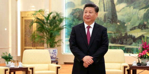 Chinese President Xi Jinping waits for the arrival of U.S. National Security Adviser Susan Rice for their meeting at the Great Hall of the People in Beijing, China, Monday, July 25, 2016. (How Hwee Young/Pool Photo via AP)