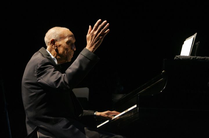 MIAMI BEACH, UNITED STATES: Cuban pianist and composer Bebo Valdes, 87, plays the piano with Jazz at Lincoln Center's Afro-Latin Jazz Orchestra at the Jackie Gleason Theater in Miami Beach, Florida 19 October 2006. Bebo has won two Latin Grammys and a regular Grammy and his latest CD was nominated for another Grammy. AFP PHOTO/Roberto Schmidt (Photo credit should read ROBERTO SCHMIDT/AFP/Getty Images)