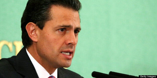 Enrique Pena Nieto, Mexico's president, speaks during a news conference at the Japan National Press Club in Tokyo, Japan, on Wednesday, April 10, 2013. Investors are boosting holdings of Mexican bonds as Nieto seeks to open the state-controlled oil industry to more private investment and boost tax revenue. Photographer: Haruyoshi Yamaguchi/Bloomberg via Getty Images