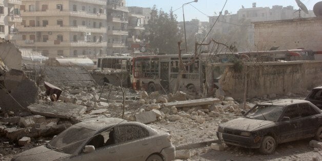 Destruction is seen following an alleged air strike by Syrian government forces on January 31, 2014 in the northern Syrian city of Aleppo. Nearly 1,900 people have been killed in Syria since peace talks opened in Switzerland on January 22, the Syrian Observatory for Human Rights said. AFP PHOTO/MEDO HALAB (Photo credit should read MEDO HALAB/AFP/Getty Images)