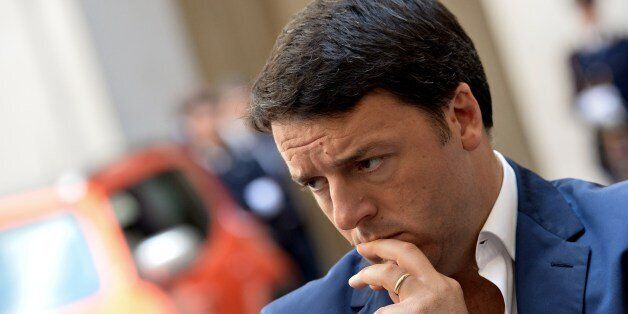 Italy's Prime Minister Matteo Renzi looks on during the presentation of a new car model by Italian automaker Fiat, on July 25, 2014 at the Palazzo Chigi in Rome. AFP PHOTO / TIZIANA FABI (Photo credit should read TIZIANA FABI/AFP/Getty Images)