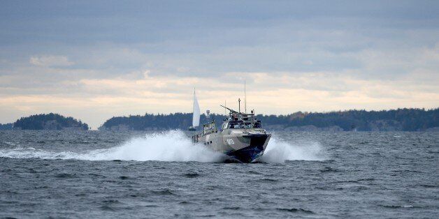 A Swedish Navy fast-attack craft patrols in the the Stockholm Archipelago, Sweden, on October 18 2014. The Swedish armed forces announced a large military operation around islands off Stockholm late Friday following reports of suspicious 'foreign underwater activity'. AFP PHOTO / TT NEWS AGENCY / PONTUS LUNDAHL / SWEDEN OUT (Photo credit should read PONTUS LUNDAHL/AFP/Getty Images)