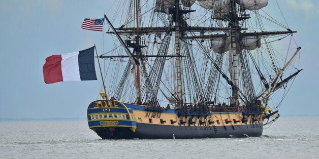 The replica of the French navy frigate L'Hermione, which played a key role in the American Revolution, and which will set sail on its maiden voyage to the United States is seen on the Charente river in Rochefort, southwestern France, on April 18, 2015. The replica of the French navy frigate Hermione which brought General Lafayette to America to rally rebels fighting Britain in the US war of independence, will set sail for the United States again, 235 years after the original crossing. L'Hermione will leave its mooring on the island of Aix in the west of France, navigate up the Charente river to the naval town of Rochefort to pay homage to its birthplace, and finally head back to Aix before heading West. AFP PHOTO / XAVIER LEOTY (Photo credit should read XAVIER LEOTY/AFP/Getty Images)
