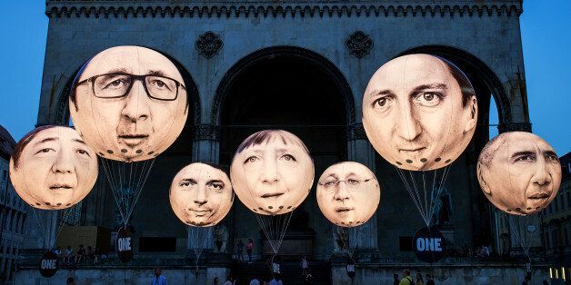 MUNICH, GERMANY - JUNE 5: Activists have installed balloons decorated with the portraits of (L-R) Japanese Prime Minister Shinzo Abe, French President Francois Hollande, Italian Prime Minister Matteo Renzi, German Chancellor Angela Merkel, Canadian Prime Minister Stephen Harper, British Prime Minister David Cameron and US President Barack Obama during a protest activity against the G7 summit on June 5, 2015 in Munich, Germany. Germany will host the G7 summit at Elmau Castle near Garmisch Partenkirchen, southern Germany on June 7 and 8, 2015. (Photo by Joerg Koch/Getty Images)