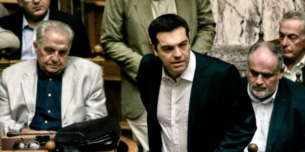 ATHENS, GREECE - JUNE 27: Greece's Prime Minister Alexis Tsipras attends an emergency Parliament session for the government's proposed referendum June 27, 2015 in Athens, Greece. Greece's fraught bailout talks with its creditors took a dramatic turn early Saturday, with the radical left government announcing a referendum in just over a week on the latest proposed deal . (Photo by Milos Bicanski/Getty Images)