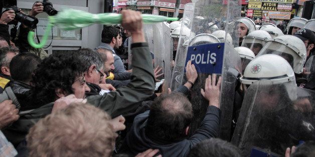 Protesters clash with police in Istanbul, Turkey, Tuesday, Oct. 13, 2015. Scuffles broke out after authorities in Istanbul banned a protest rally and march by the same trade union and civic society groups who lost friends and colleagues in Turkey's bloodiest terror attack in Ankara on Oct. 10, 2015. The two suicide bombings in the capital came amid political uncertainty in the country â just weeks before Turkey's Nov. 1 election. (AP Photo/Cagdas Erdogan)