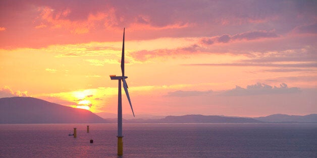 BARROW IN FURNESS, UNITED KINGDOM - UNDATED: (EXCLUSIVE COVERAGE) General view of the Walney offshore windfarm from the jack up barge, Kraken, off Barrow in Furness, Cumbria, England. Behold Britain's green future in the form of the Â£1.6 billion largest off-shore wind farm in the country. Located in the Irish Sea, off Barrow-in-Furness, Cumbria this eco-friendly megastructure will generate enough power for 320,000 homes. The barges used to house the equipment and crew needed to construct the giant turbines are so big they resemble the north sea platforms of the oil age. The 102 turbines have a rotor blade length of up to 390 feet - and together they generate 367 MW, which is connected to the mainland by a 12 miles long fibre optic cable which is buried seven foot under the seabed. The wind farm is owned and constructed by Dong Energy. (Photo by Ashley Cooper / Barcroft Media / Getty Images)