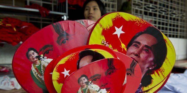Various fans with portraits of Myanmar opposition leader Aung San Suu Kyi are seen for sale outside the National League for Democracy (NLD) party headquarters in Yangon on November 11, 2015. Aung San Suu Kyi's opposition appeared on the verge of a landslide election win that could finally reset Myanmar after decades of army control, as a top member of the ruling party said they had 'lost completely'. AFP PHOTO / ROMEO GACAD (Photo credit should read ROMEO GACAD/AFP/Getty Images)