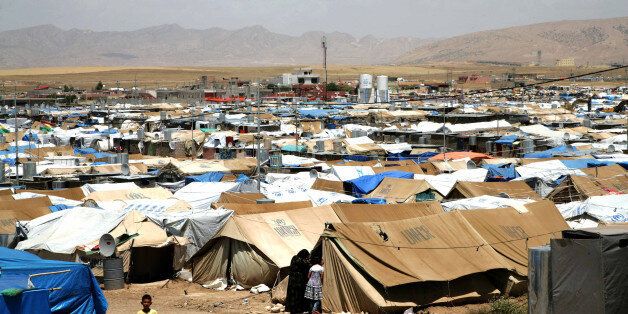 A general view of the Domiz refugee camp, 20 km southeast of the northern Iraqi city of Dohuk, which houses Syrian-Kurd refugees, on May 29, 2013. More than 90,000 people have been killed and over 1.5 million Syrians have fled to neighbouring countries since the conflict began in March 2011. AFP PHOTO/SAFIN HAMED (Photo credit should read SAFIN HAMED/AFP/Getty Images)